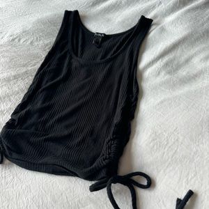 Black ribbed tank top! With adjustable sides! Very comfy and stretchy!